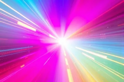 A vibrant, high-energy abstract composition representing the power of TVIColor: swirling gradients of electric cyan, magenta, and gold light radiating from a central point, with dynamic light trails and subtle pixel-like particles suggesting digital color transformation, evoking innovation and visual impact in a futuristic display environment
