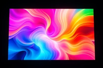 A vibrant, colorful television screen displaying a dynamic abstract pattern of swirling rainbow hues, soft gradients, and glowing light trails, evoking a sense of visual delight and digital artistry, centered in a dark room with subtle ambient reflections, ultra-high detail, 8K resolution, cinematic lighting